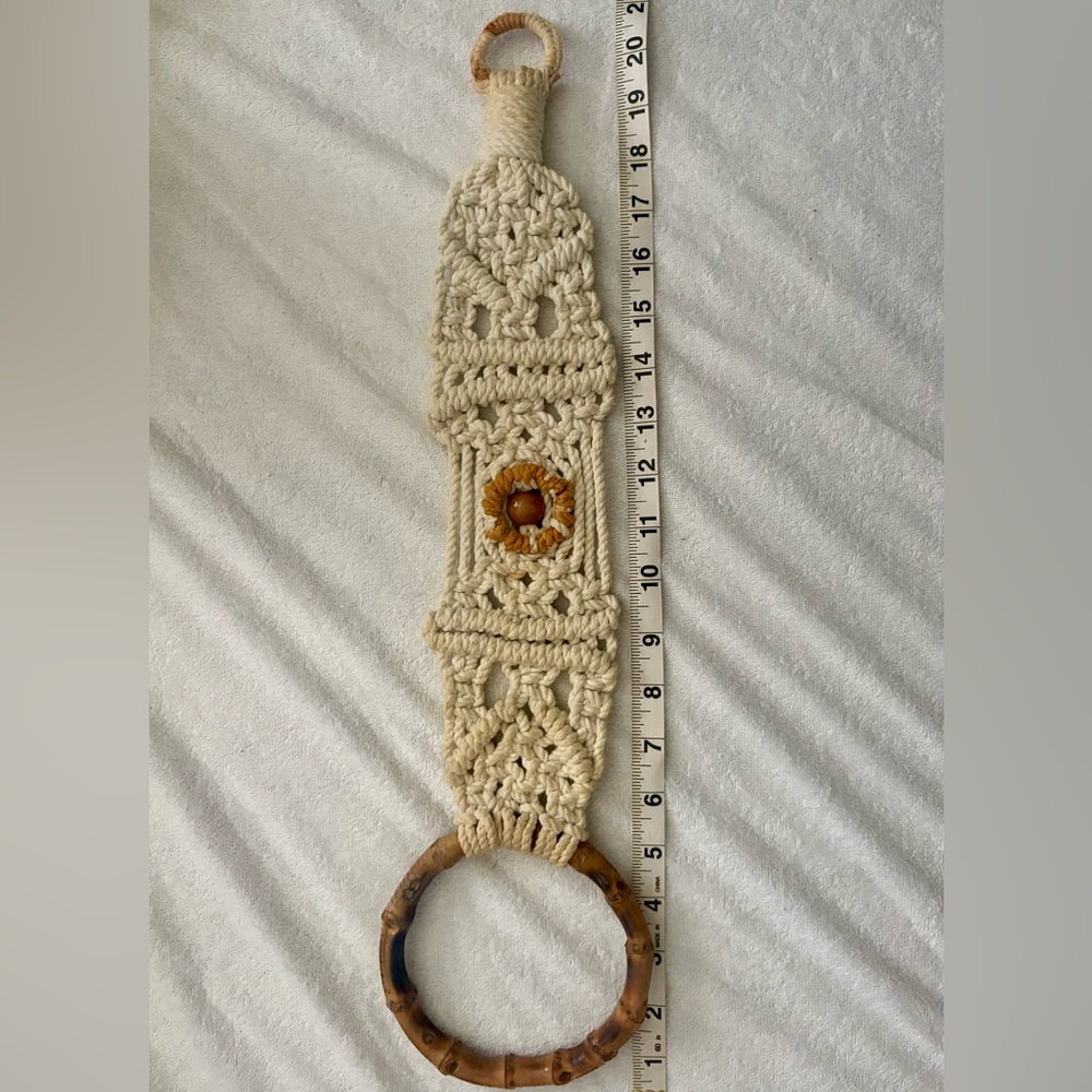 Vintage handmade macrame towel holder